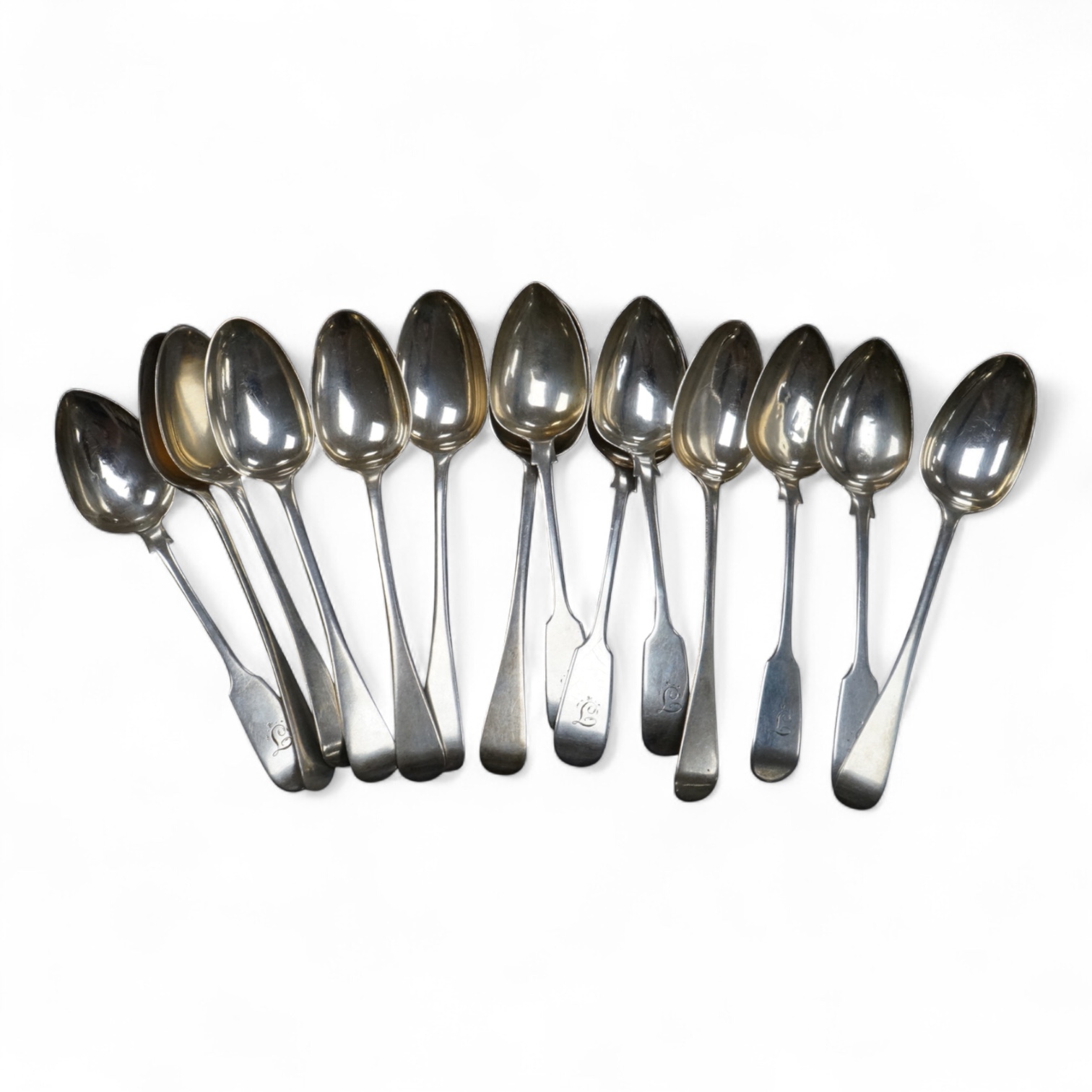 A set of eight George IV silver Old English pattern teaspoons, William Eaton, London 1827, 14.2cm, together with a set of six early Victorian provincial silver fiddle pattern teaspoons, by John Walton, Newcastle, 1842, 7